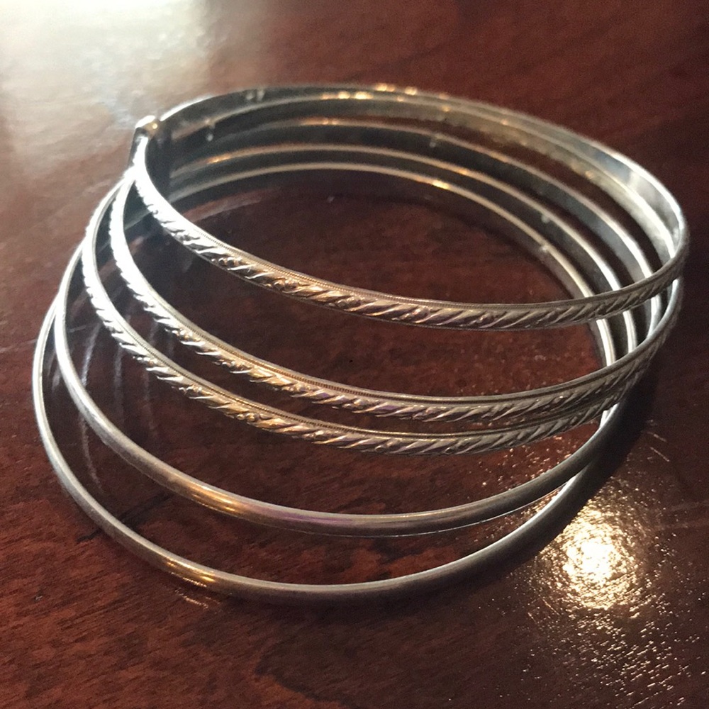 Metal bangles with braid pattern